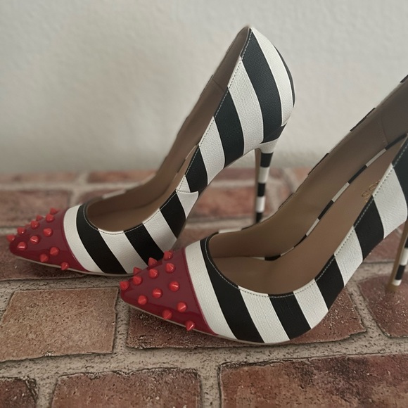 Beautiful Wet kiss spiked heels. Cruella DeVille
Bought @ boutique in LA - Picture 3 of 4